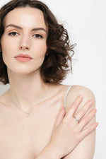 Load image into Gallery viewer, Balto aukso pakabukas su briliantais Širdelė (0,16 ct)