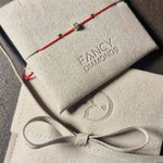 Load image into Gallery viewer, Raudono siūlo apyrankė su 0,03 ct deimantu