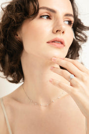 Balto aukso kolje su briliantais (0,72 ct)